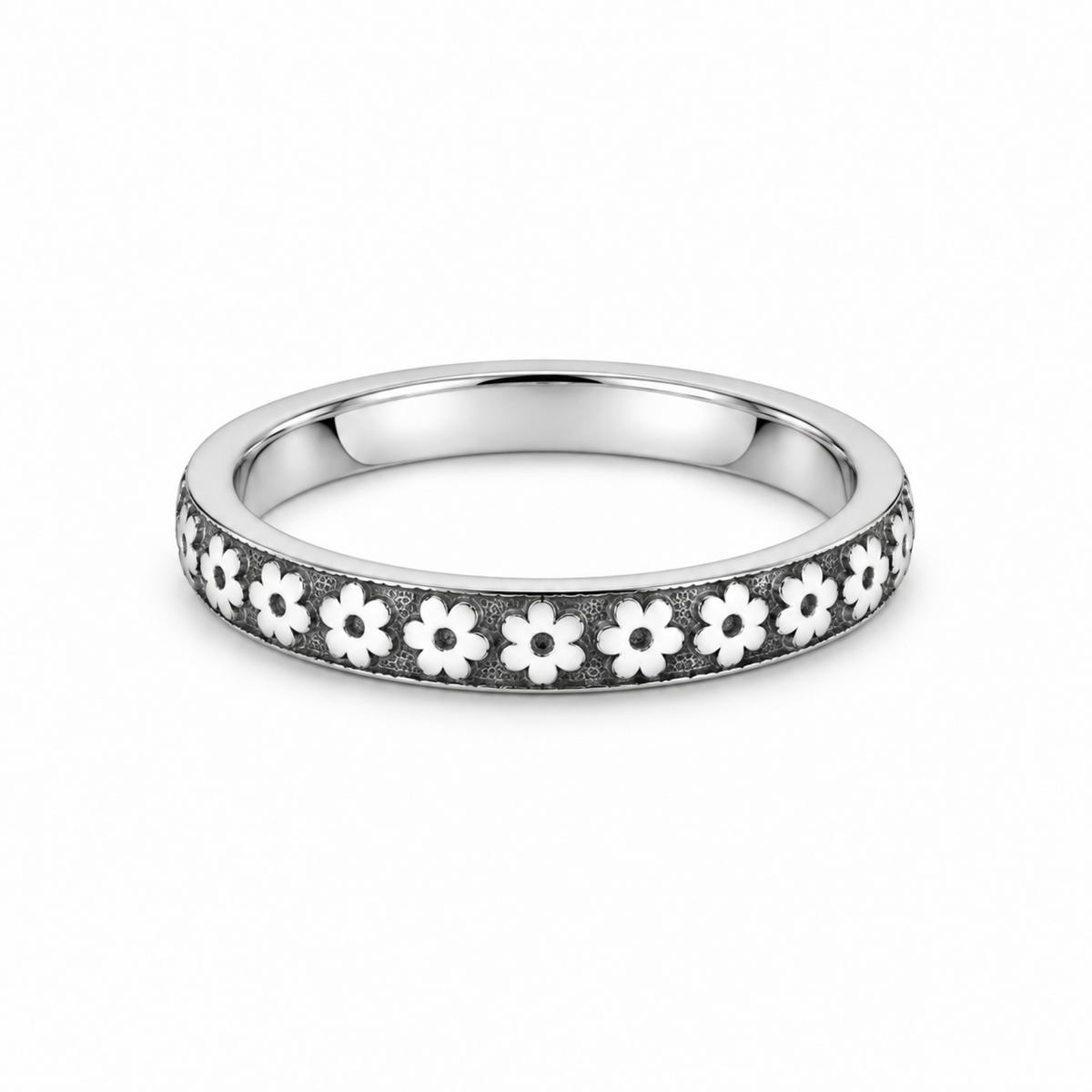 A platinum wedding ring with a daisy chain running through the centre of the ring.