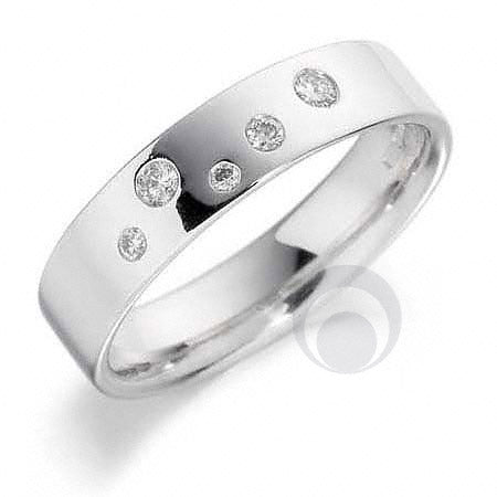 A diamond platinum wedding ring with multiple small diamonds set around the band.