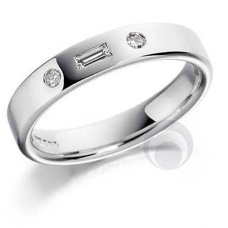 A platinum diamond set wedding ring set with a centre baguette diamond and two round cut diamonds set either side.