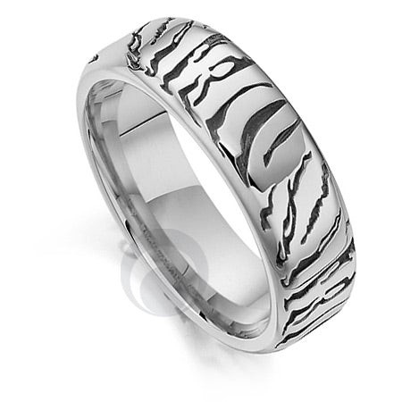A polished platinum wedding ring with a patterned tiger design.