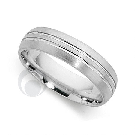 A platinum wedding ring with a classic cut pattern