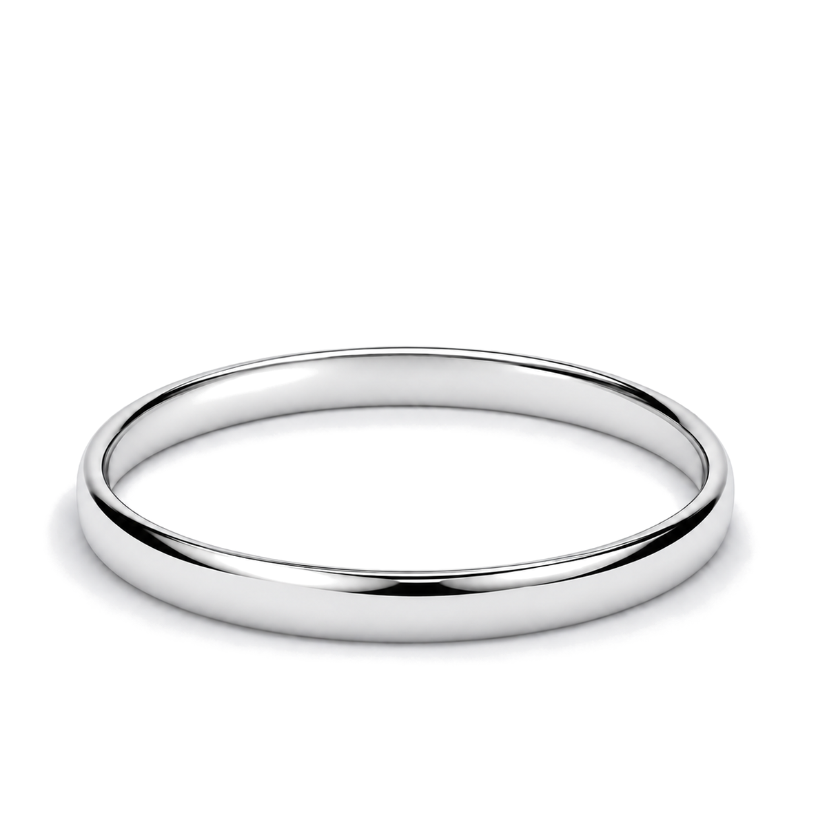 A minimalist, platinum wedding ring photographed on a clean white background.