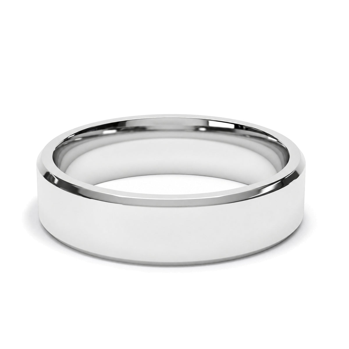 A platinum beveled edge flat court wedding ring with a bright polished finish.