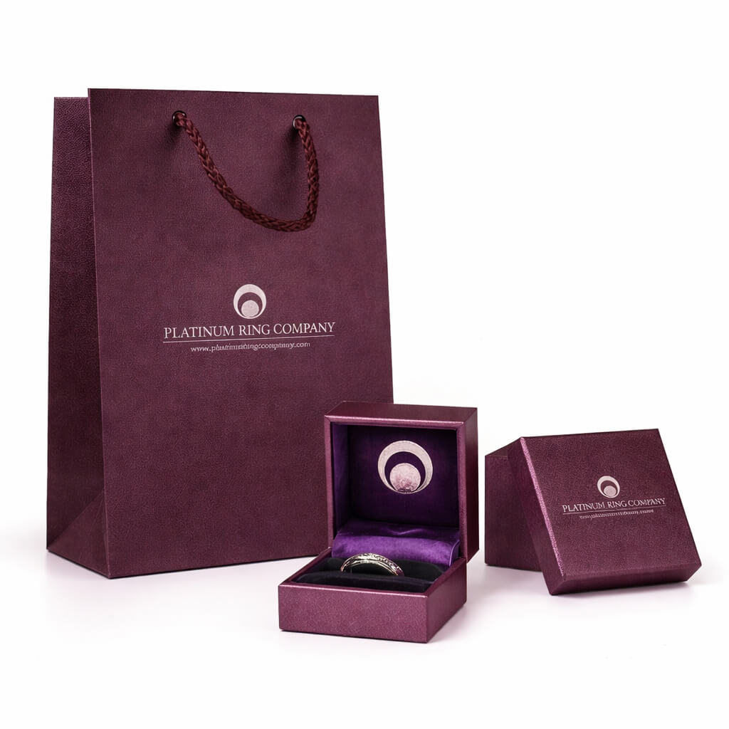 Purple jewelry packaging with 'Platinum Ring Company' branding on a white background