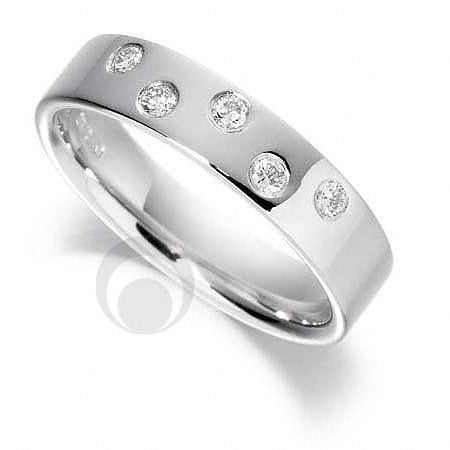 A diamond platinum wedding ring with multiple diamond accents set in a polished finish.
