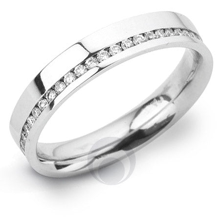 A diamond platinum wedding ring with a round brilliant cut diamond in the center.