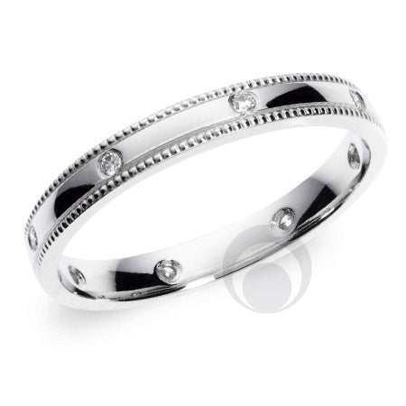 A polished  diamond platinum wedding ring with a round brilliant cut diamond in the center.