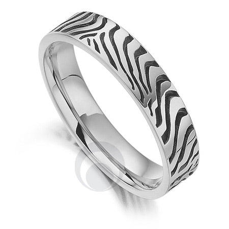A polished platinum wedding ring with a zebra pattern design.