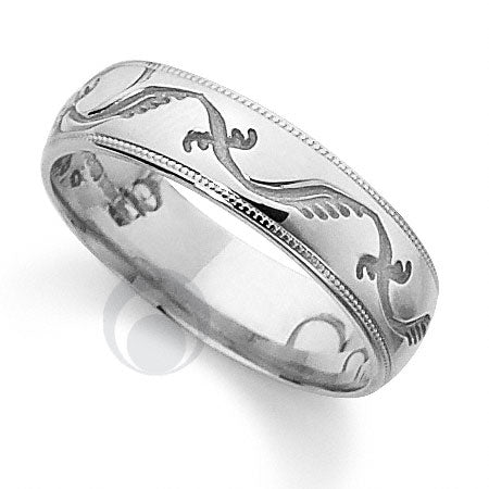 A polished platinum wedding ring with a classic cut pattern.