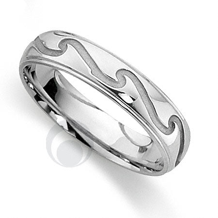 A polished platinum wedding ring with a classic cut pattern.