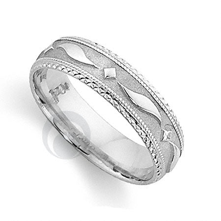 A polished and textured platinum wedding ring with a classic cut pattern and a comfort fit interior.