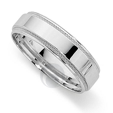 A British hallmarked platinum wedding ring with a classic cut pattern and a polished finish.