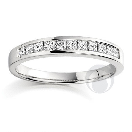 A platinum diamond eternity ring set with princess cut diamonds. Diamonds set within a channel.