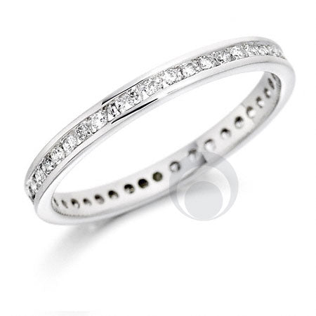 A platinum diamond set eternity ring. Round cut diamonds set within a channel.